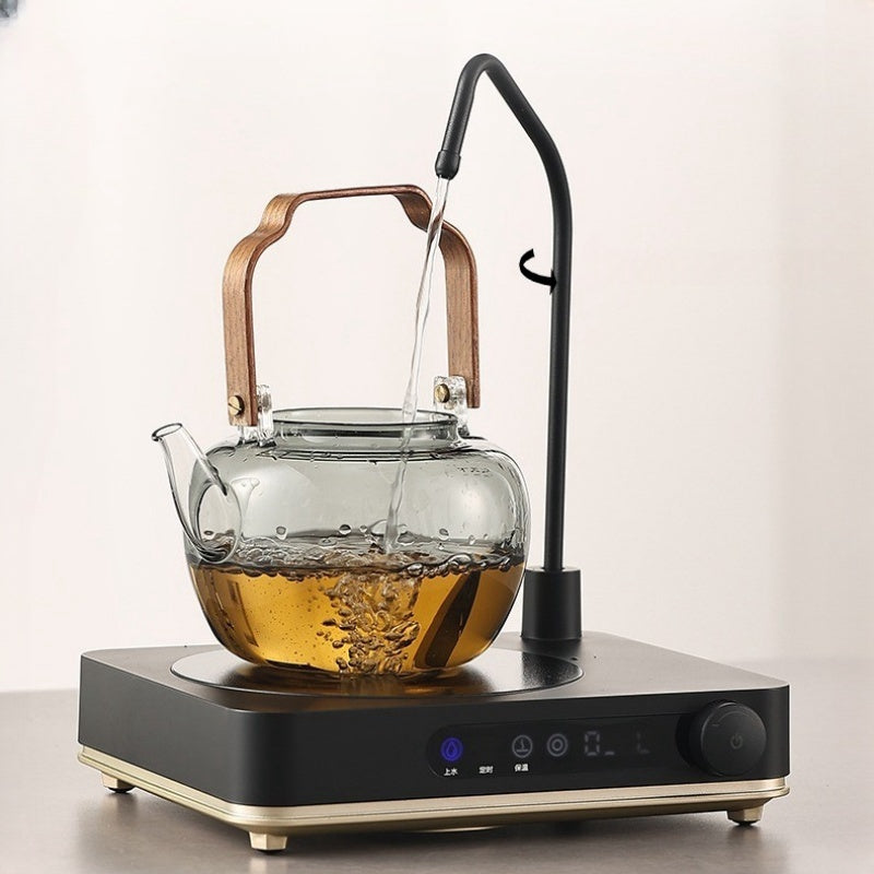 An Automatic Water Filling Electric Tea Stove and Tea Pot Set