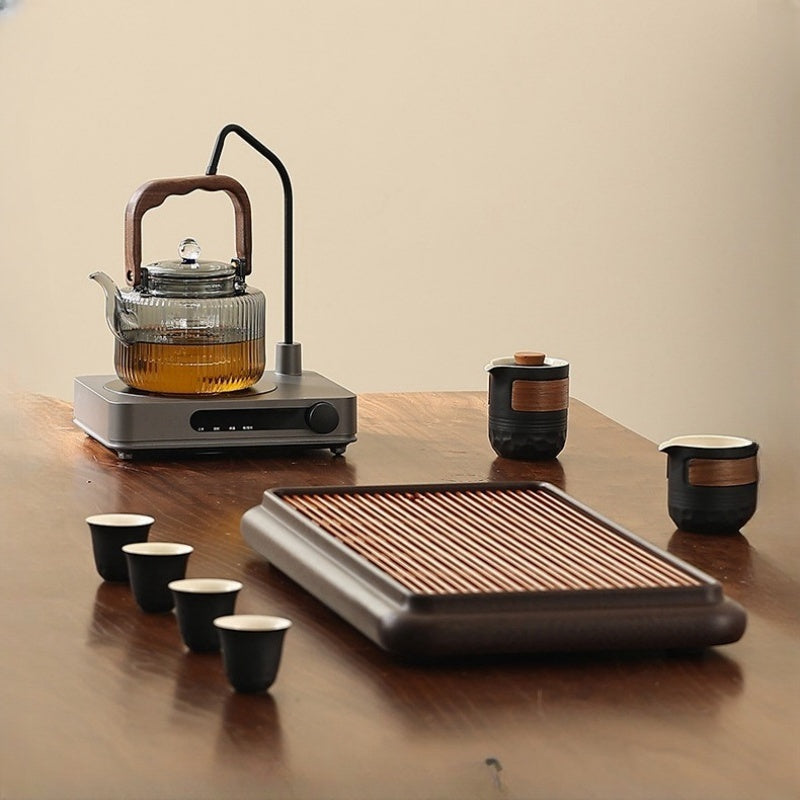 An Automatic Water Filling Electric Tea Stove and Tea Pot Set