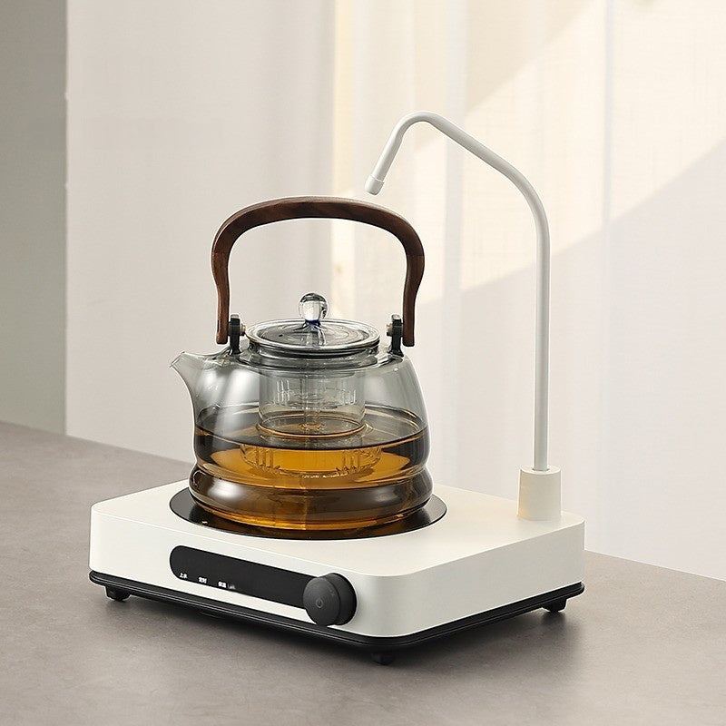 An Automatic Water Filling Electric Tea Stove and Tea Pot Set